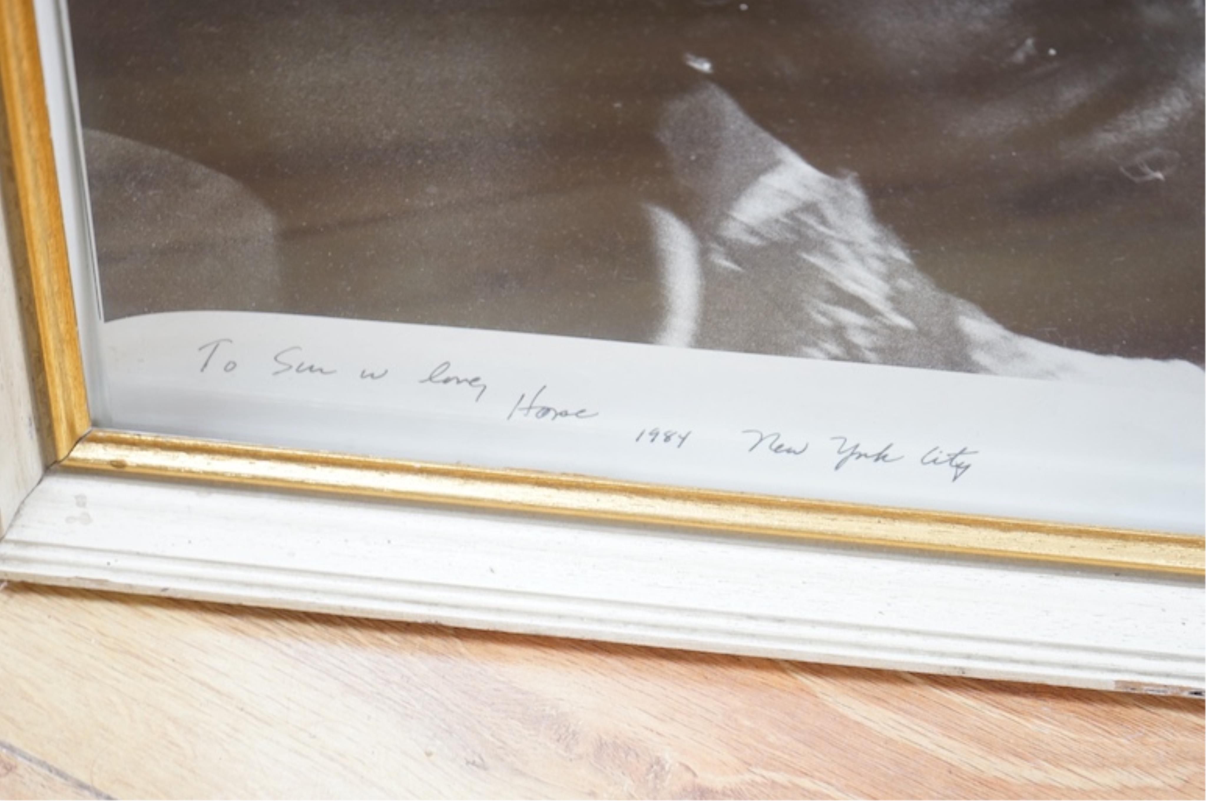 Hope Sandrow, photograph, with pen dedication to the gallery owner Sur Rodney underneath the main image reading; ‘To Sur with love, Hope, 1984 New York City’. Condition - fair, repairs needed to the frame.